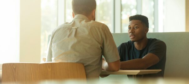 two men talking