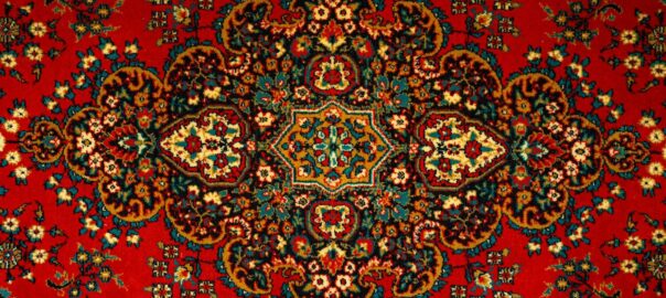 a red carpet with a colorful design on it