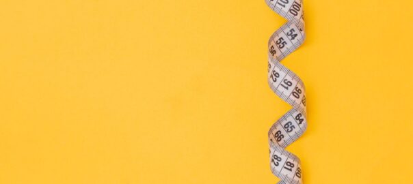 black and white snake on yellow background